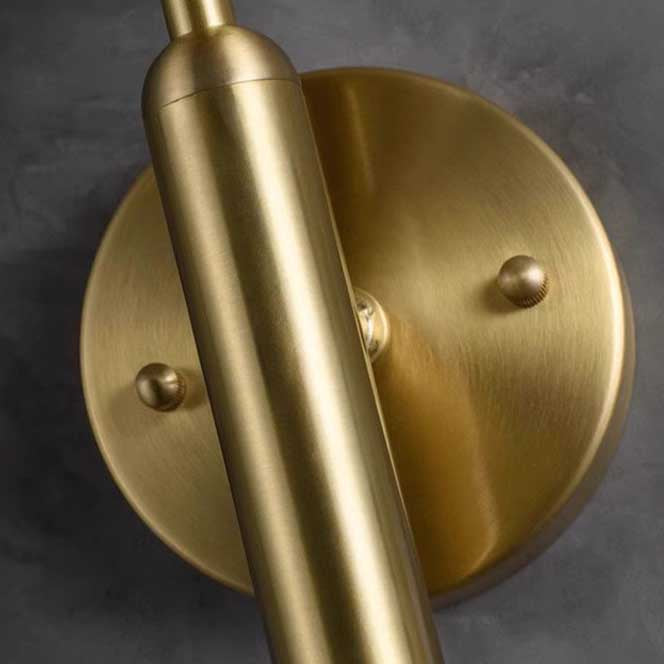 Aelios Wall Light's gold metal lamp holder detail is shown.