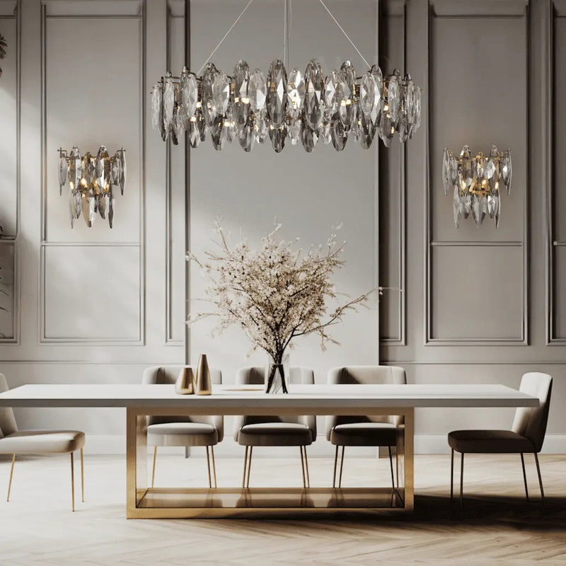 The Crescent black crystal chandelier is on display in the dining room, the crystal lighting is hanging above the dining table.