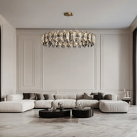 Crescent black crystal chandelier is on display in the living room, the crystal lighting hanging above the coffee table.