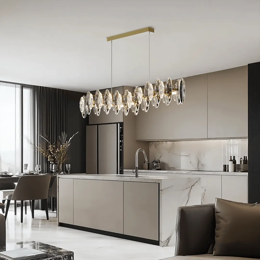 The Crescent crystal pendant light hangs in the contemporary style kitchen above the kitchen island.