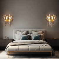 Two Crescent Crystal Wall Sconce hangs on the bedroom wall, adding a luxurious touch to the bedroom.