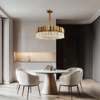 Hera crystal round chandelier with gold stainless steels and crystal, the  crystal lighting in dinning room with 4 white chairs and  a table.