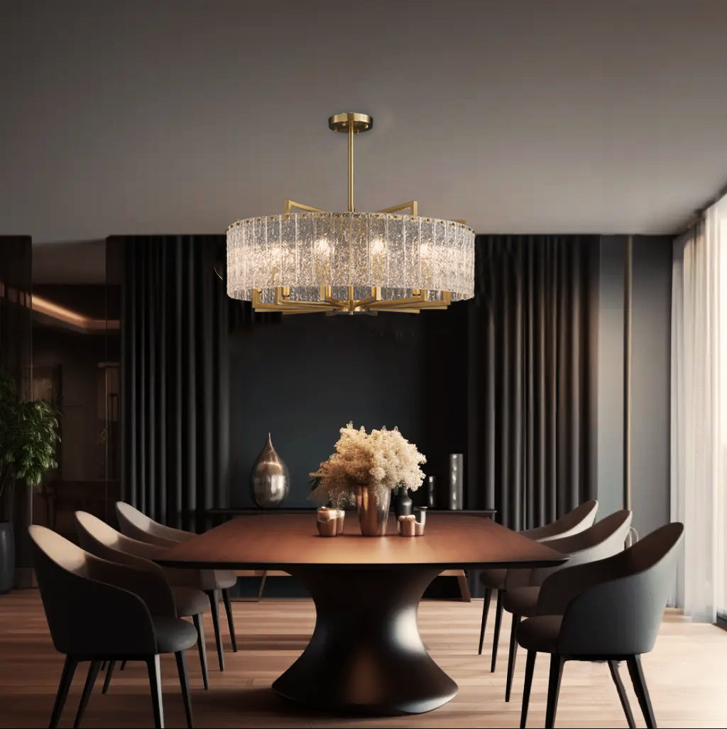 Hestia crystal round chandelier is shown in the dining room, the crystal lighting over a modern style dining table with black dining table and chairs.