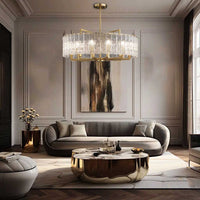 Hestia crystal round chandelier, the crystal lighting is shown in the living room above a modern style coffee table next to a matching gray sofa.