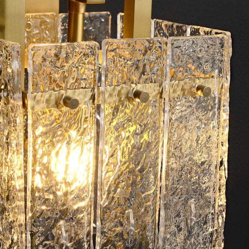 Showcasing Hestia Wall Light's stone patterned crystal shades.