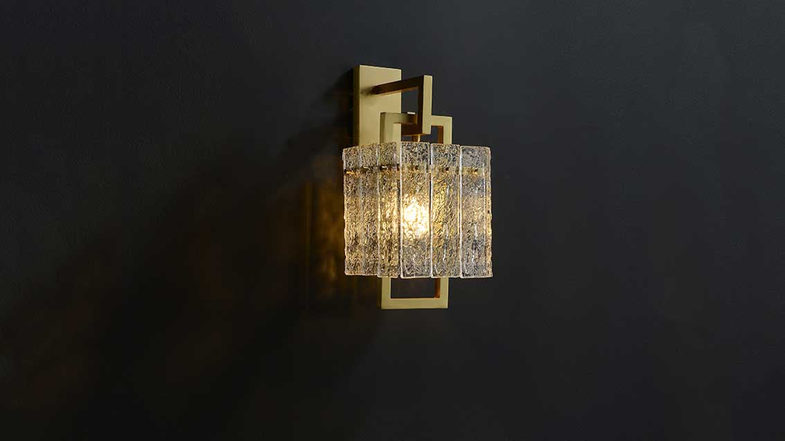 Hestia crystal wall sconce turn on display.