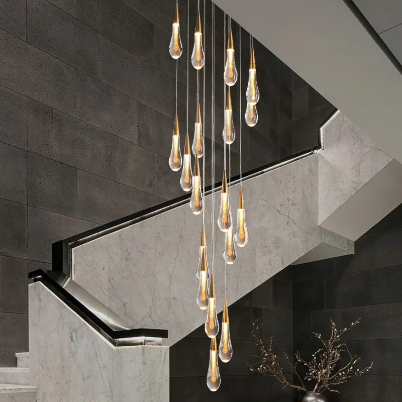 The Indura staircase crystal lighting hangs in the center of the staircase and illuminates the entire staircase.