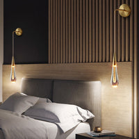 Indura crystal wall sconce for bedside lighting decoration on both bedsides of the bedroom.