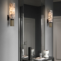 Tera Wall Sconce display image in Bathroom.