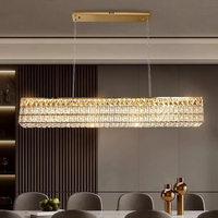 Rectangular crystal chandelier of Cacci crystal pendant light in dinning room for MOSA Lighting.